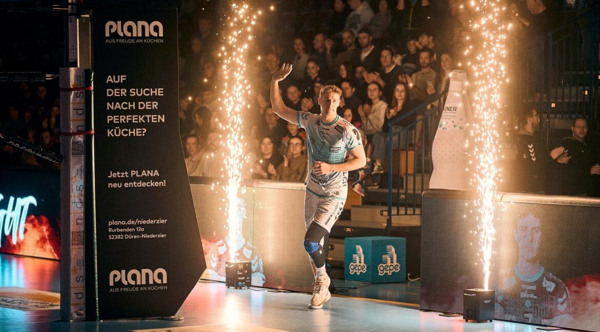 Alex Knight being introduced before game with pyrotechnics going off