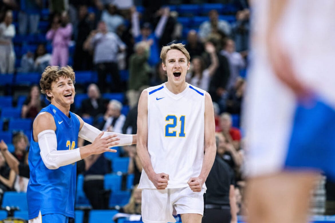 Zach Rama celebrating with teammates. 